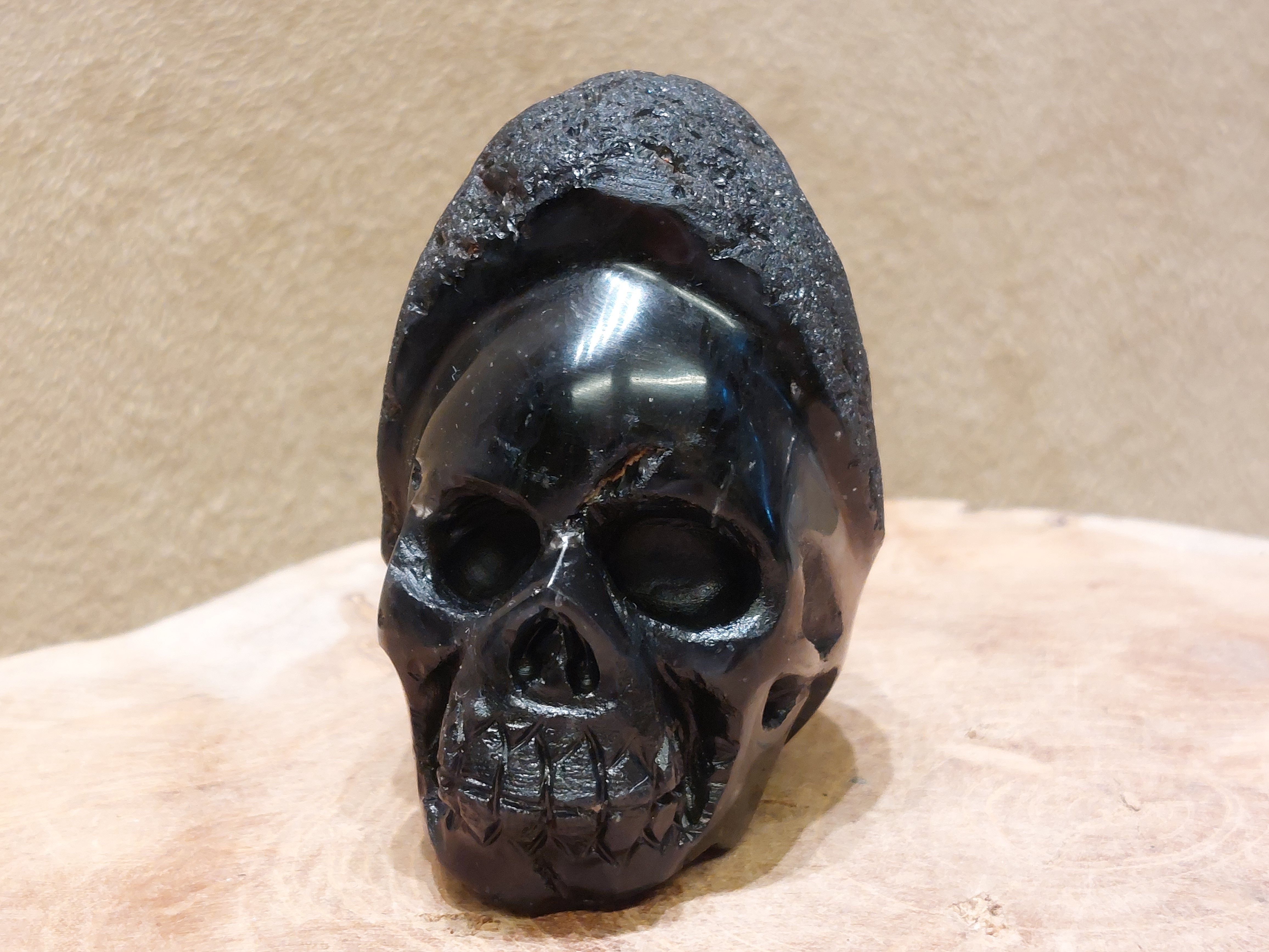 Cintamani human skull