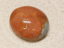 Polychroom jaspis handsteen