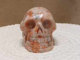 Zonnesteen human skull