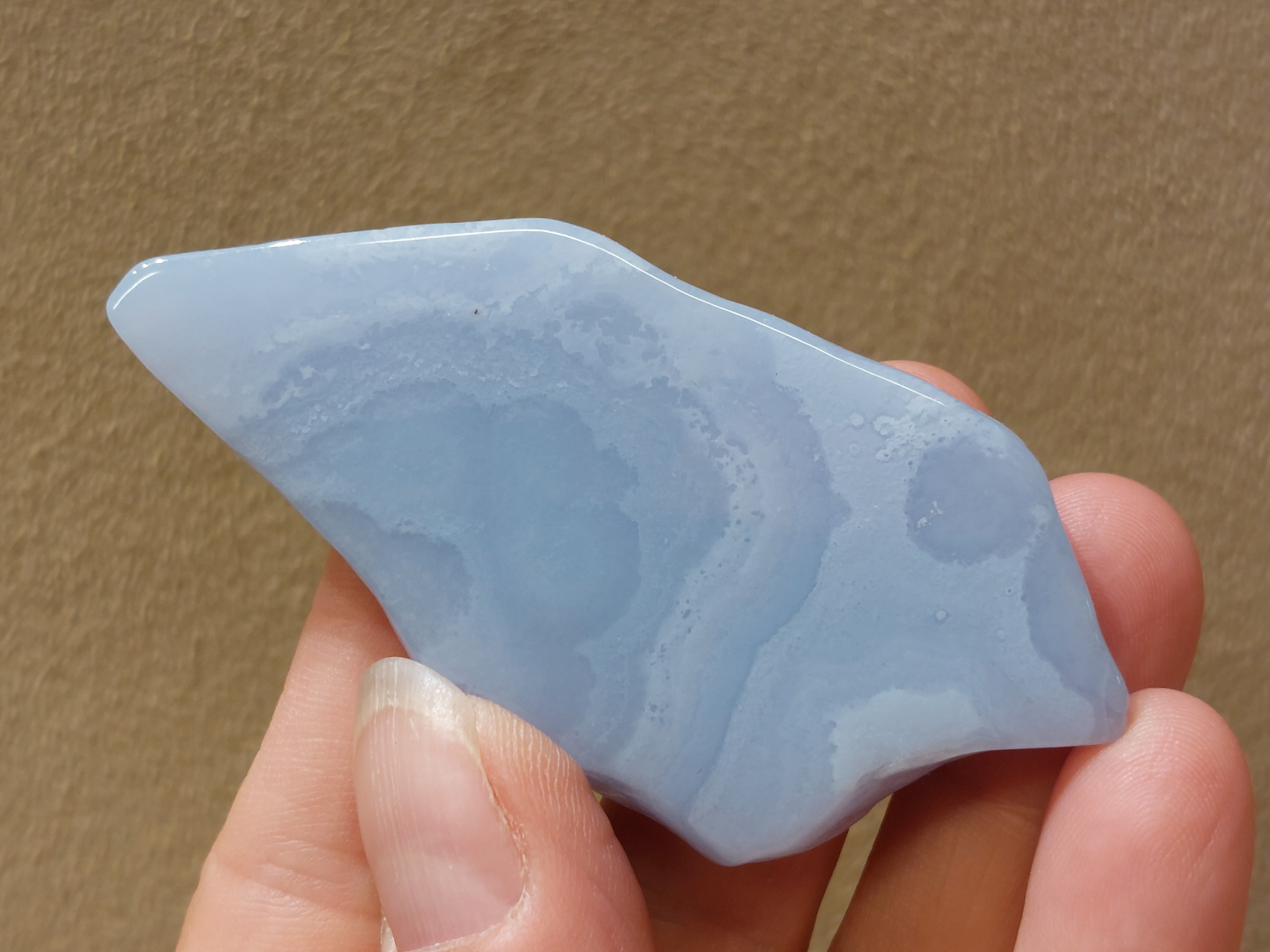 Blauwe chalcedoon/ blue lace agaat schijf