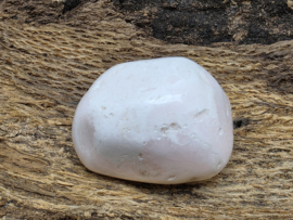 Mangano calciet handsteen