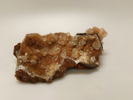 Calciet met hematiet cluster uit Mexico