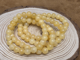 Oranje calciet armband 8 mm