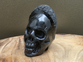 Cintamani human skull