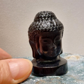 Zwarte obsidiaan boeddha hoofd