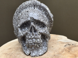 Cintamani human skull