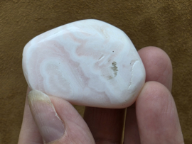 Mangano calciet handsteen