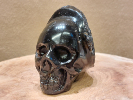 Cintamani human skull