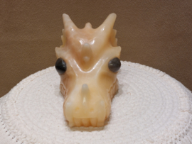 Oranje calciet draak