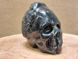Cintamani human skull