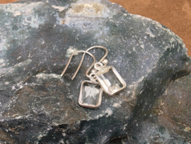 Bergkristal oorbellen in zilver facet geslepen