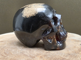 Blauwe amber human skull