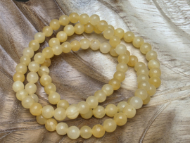 Oranje calciet armband 6mm