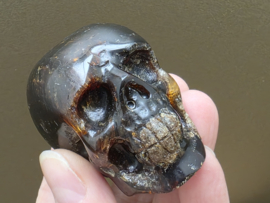 Blauwe amber human skull