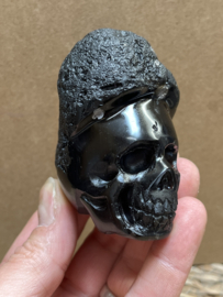 Cintamani human skull