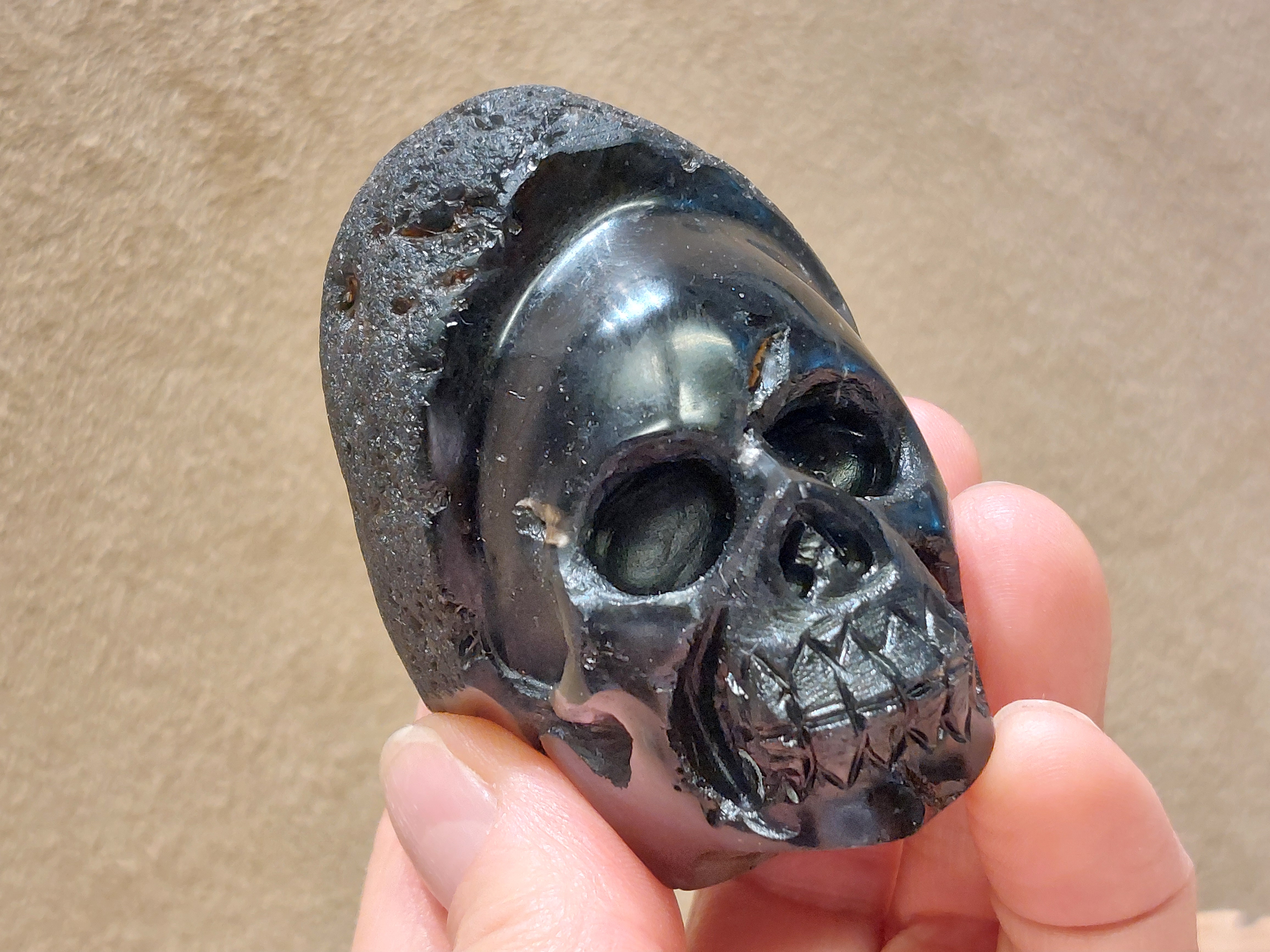 Cintamani human skull