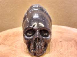 Cintamani human skull