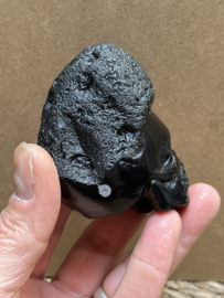 Cintamani human skull