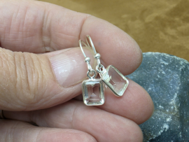 Bergkristal oorbellen in zilver facet geslepen