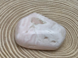 Mangano calciet handsteen