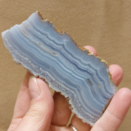 Blauwe chalcedoon/ blue lace agaat schijf