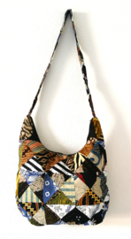 Schoudertas 38 x 29 cm. Hoofdvak en zijvak met rits. Gevoerd.