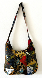 Schoudertas 38 x 29 cm. Hoofdvak en zijvak met rits. Gevoerd.