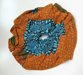 Schitterende batik wokkel/scrunchie. Voor paardenstaart, vlecht of knot. Met dubbelzijdige batik print.