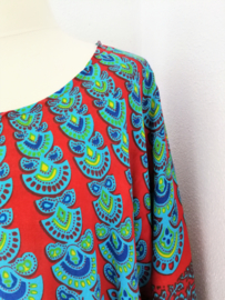 Sarongshirt Pauw. Symbool van onsterfelijkheid.