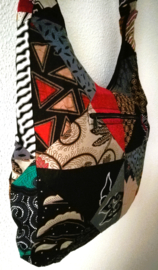 Schoudertas 38 x 29 cm. Hoofdvak en zijvak met rits. Gevoerd.