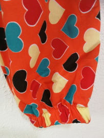 Kinderbroek hartjes oranje. 10/12 jaar.