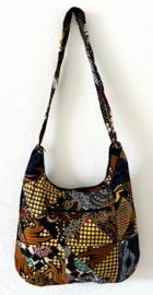 Schoudertas 38 x 29 cm. Hoofdvak en zijvak met rits. Gevoerd.