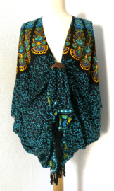 Sarong vest pauw, zwart/oker/blauw.  Symbool van onsterflijkheid. 100% rayon, met sarong knoop.