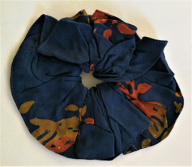 Schitterende batik wokkel/scrunchie. Voor paardenstaart, vlecht of knot. Met dubbelzijdige batik print.