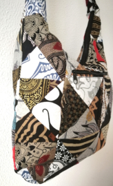 Schoudertas 38 x 29 cm. Hoofdvak en zijvak met rits. Gevoerd.