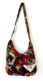 Schoudertas 38 x 29 cm. Hoofdvak en zijvak met rits. Gevoerd.