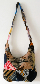 Schoudertas 38 x 29 cm. Hoofdvak en zijvak met rits. Gevoerd.