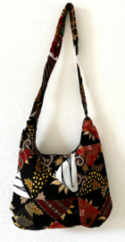 Schoudertas 38 x 29 cm. Hoofdvak en zijvak met rits. Gevoerd.