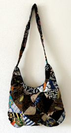 Schoudertas 38 x 29 cm. Hoofdvak en zijvak met rits. Gevoerd.