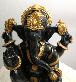 Ganesha met de vier armen.