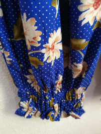 Kinderbroek bloempjes blauw. 10/12 jaar.