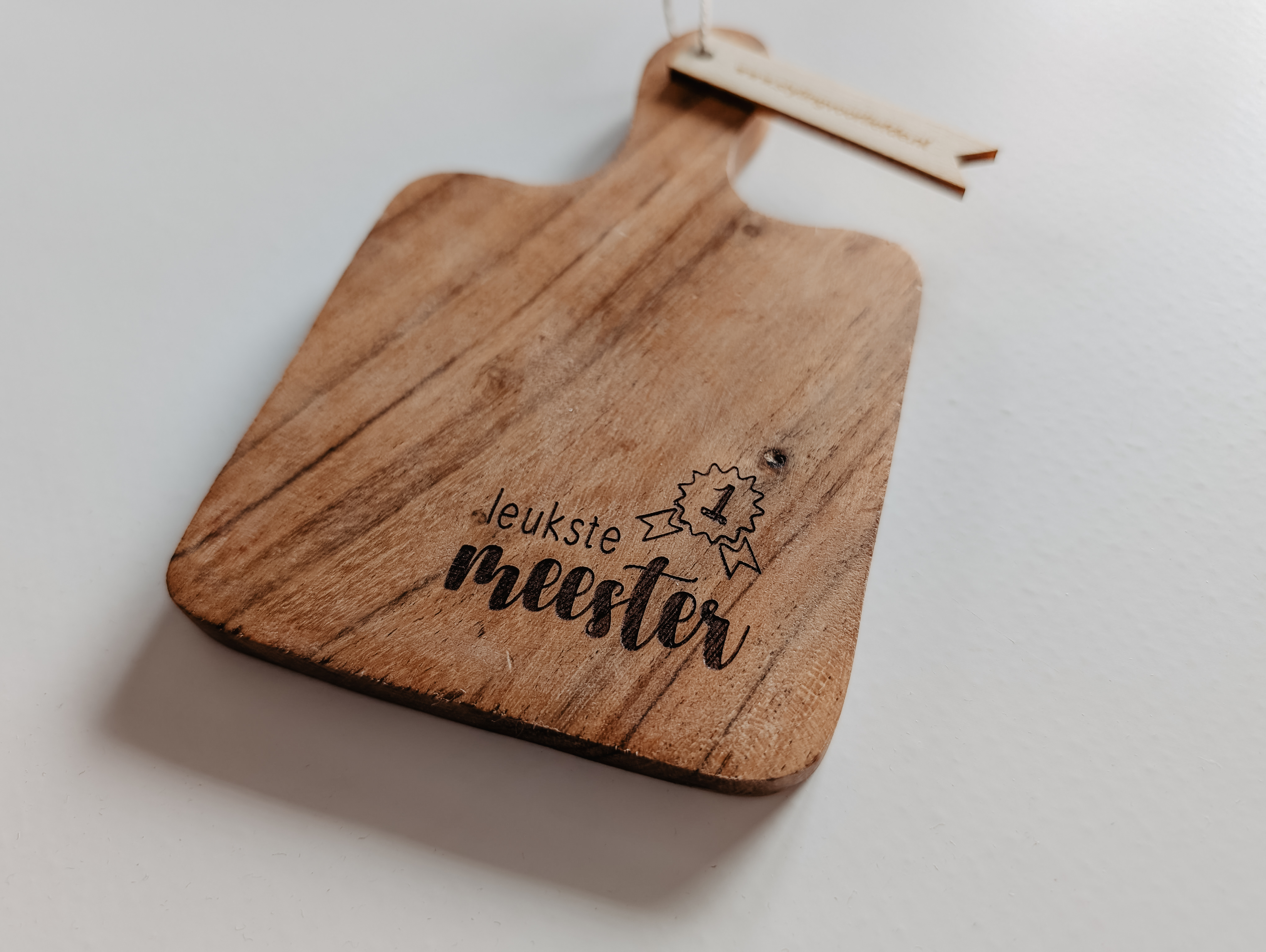 Houten onderzetter – ‘Leukste meester’ gegraveerd