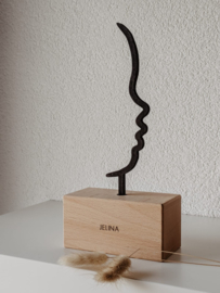 Silhouet van hout  op standaard