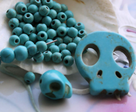 1 kraal/hanger:  echt Turquoise Howliet - Skull - 27x25 mm