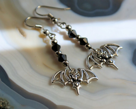 Pair of Earrings: Skeleton or Skull Cross or Bat - Silver & Black - Metal Goth