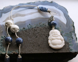 C&G Leather Cord Necklace: Serpentine Buddha & Porcelain beads