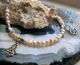 C&G Pearl Bracelet: real Freshwater Pearls with Hamsa & Ohm Charms - 22 cm