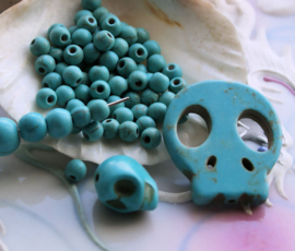 set/4 Kralen: SKULL van Howliet - 13x10 mm - Turquoise Kleur