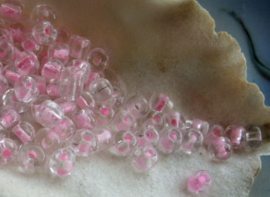 set/100 kralen: Spacer Glas - ca 4x3 mm - Transparant met Roze