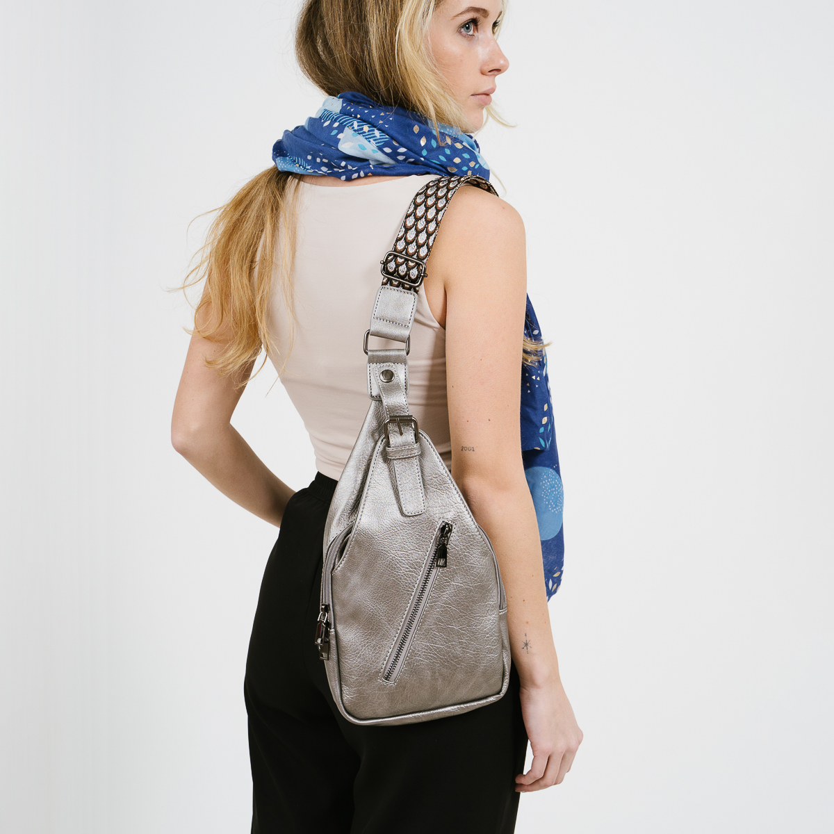 Titanium cross body